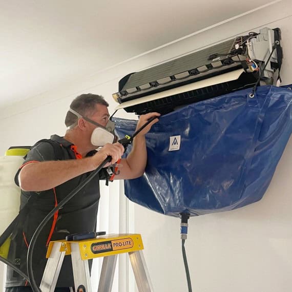 adam performing a reverse cycle air conditioning service